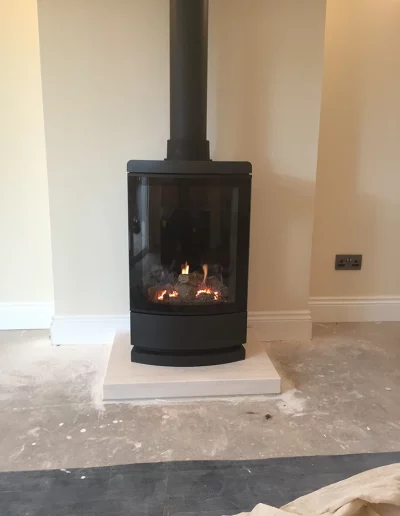 2398 Gazco Loft balance flue gas stove with limestone hearth