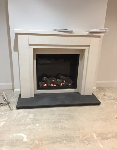 2498 Gazco Riva 750 HL gas fire in Melford limestone fireplace