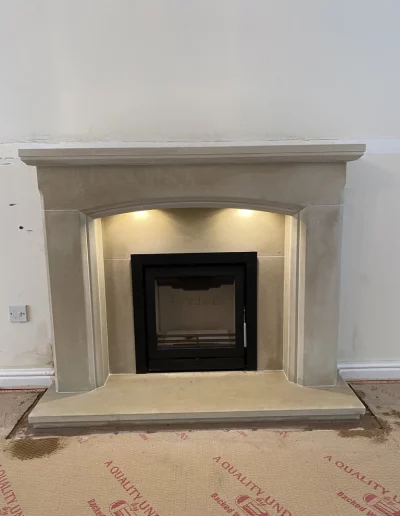 3106 Heathfiels fireplace in sandstone with Fireline FPI5W inset stove